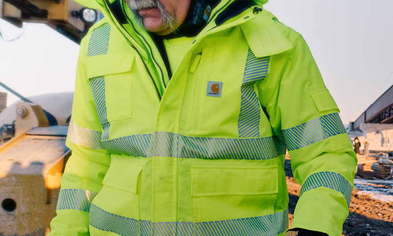 Worker in an insulated hi-vis jacket